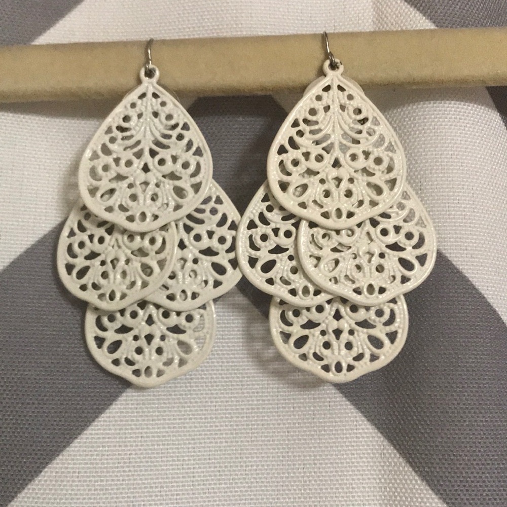 White dangling earrings